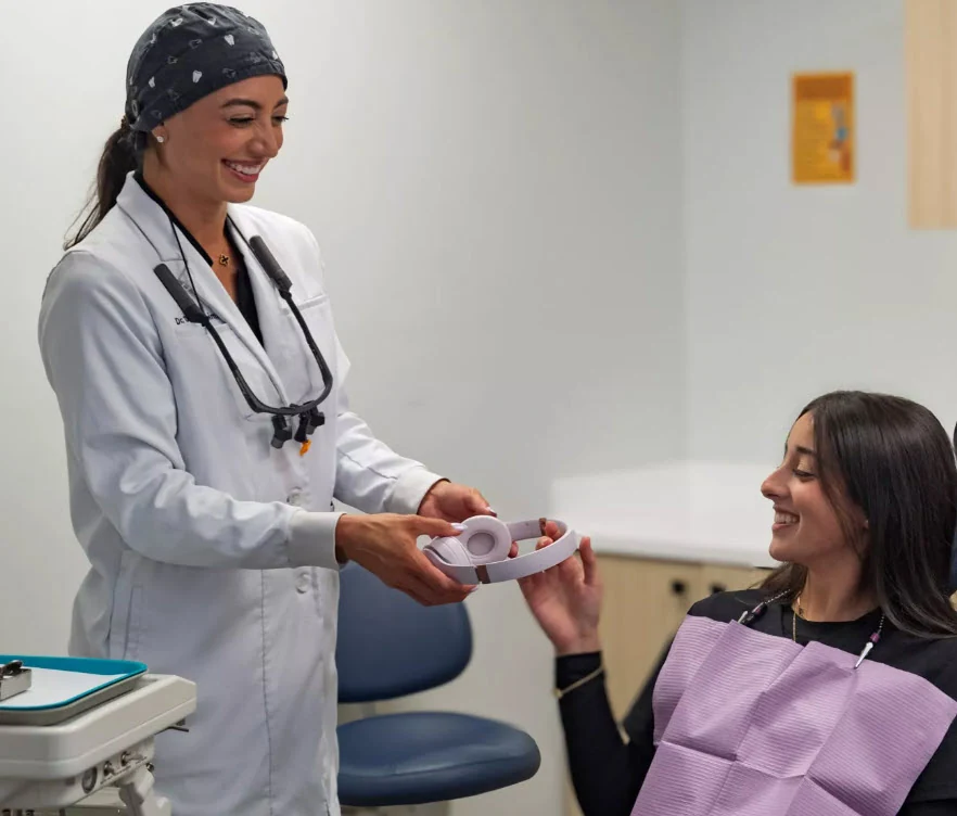A clinician providing attentive, unhurried care to an older patient