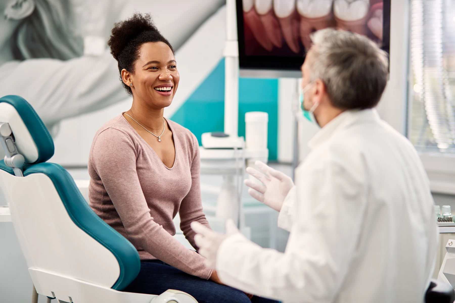 A patient consulting comfortably with a dentist