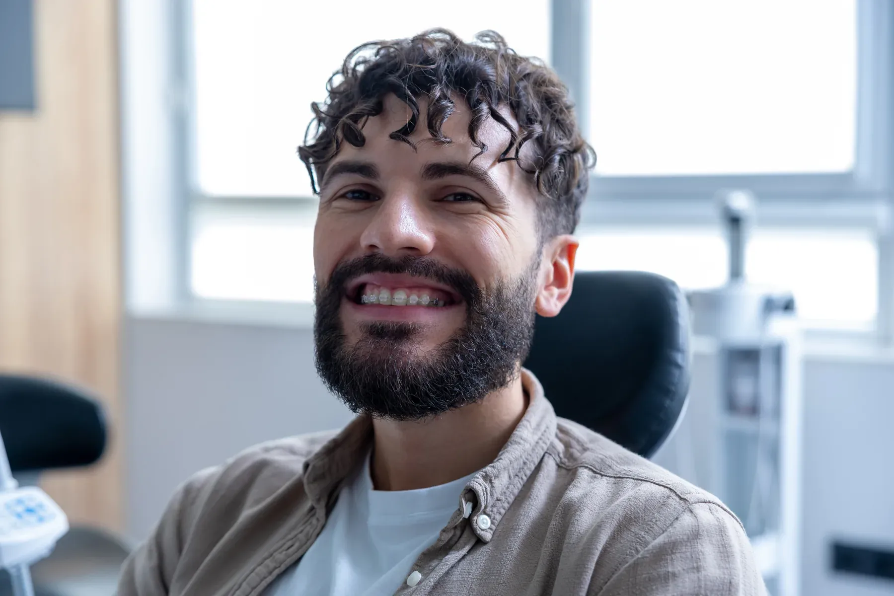 A smiling bearded man relaxing in the dental chair — Tooth-Coloured Fillings at SmilePro Dental